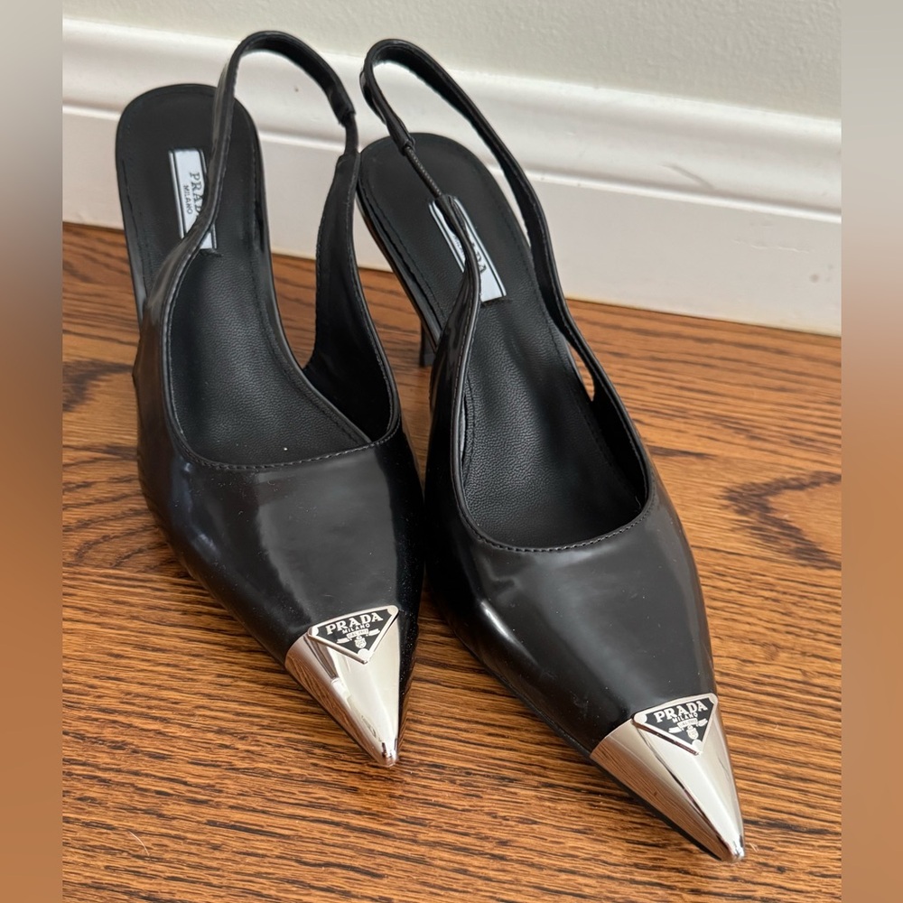 Silver tipped Prada sling back kitten heels